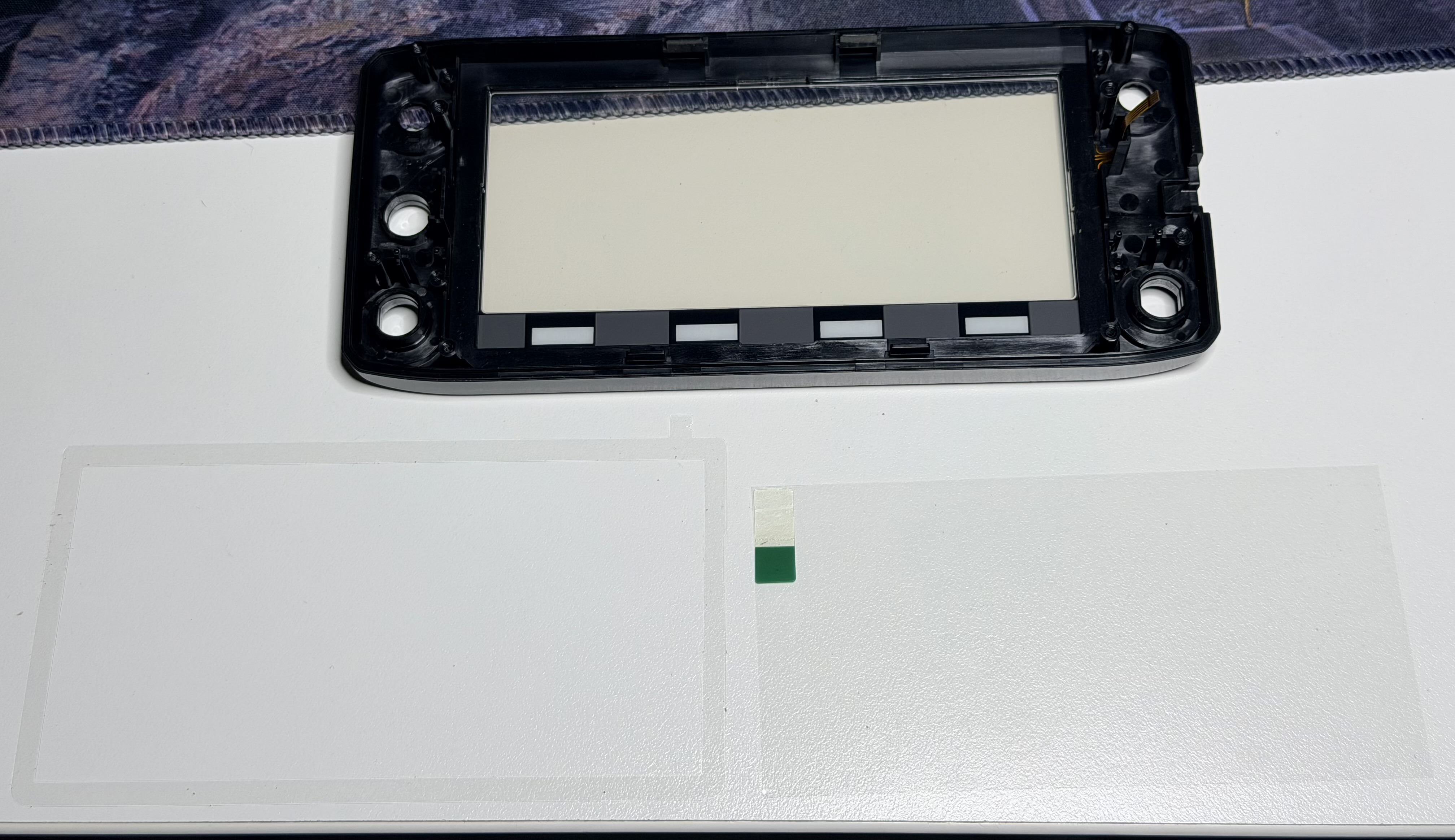 Replacement touch panel fitted to the front bezel of the ID-5100A head unit.